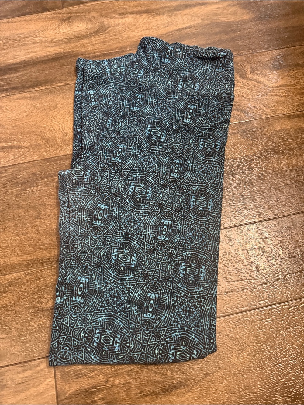 LuLaRoe Black Leggings with Teal Geometric Print
